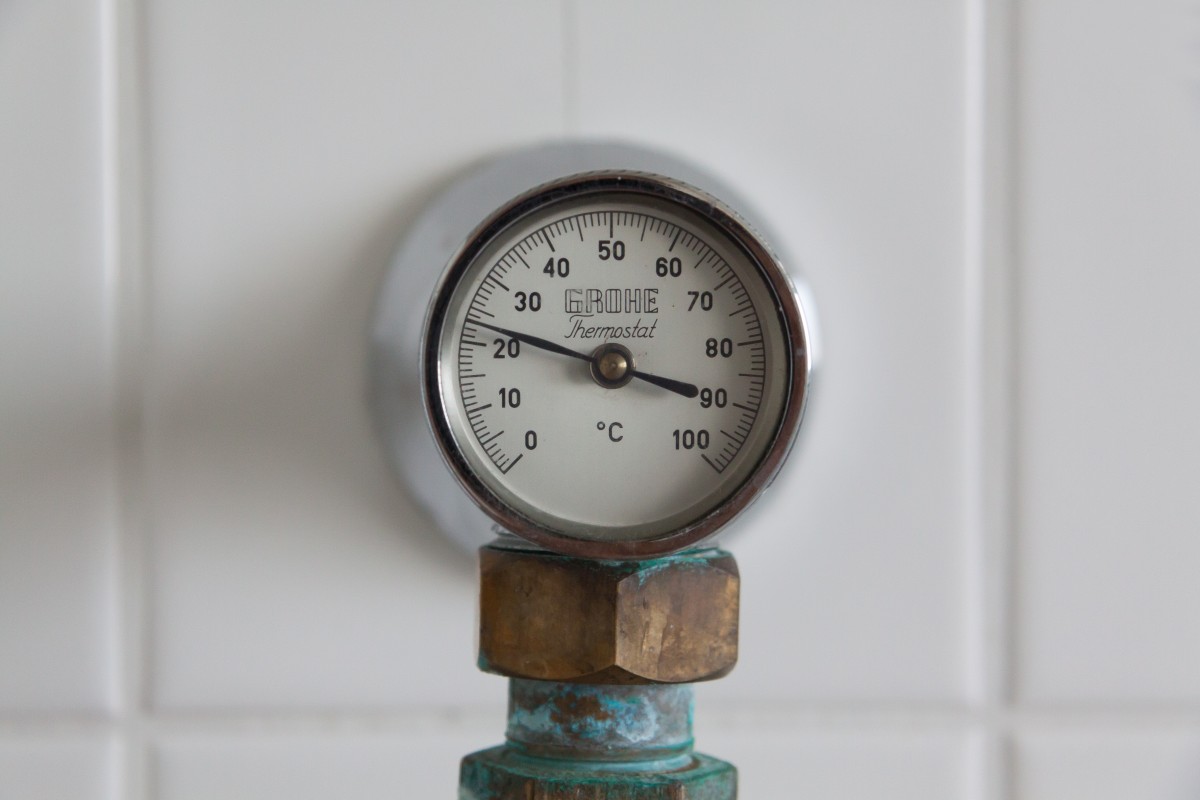 an antique Grohe temperature gauge
