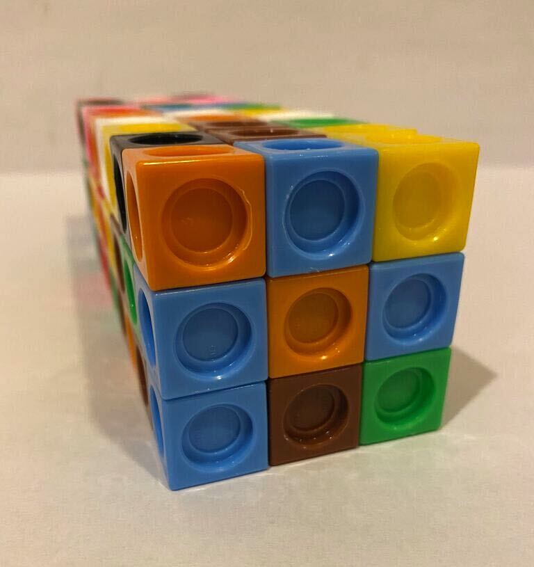 Rectangular prism. 3 cubes by unknown number between 8 to 10 cubes. Height is 3 cubes.