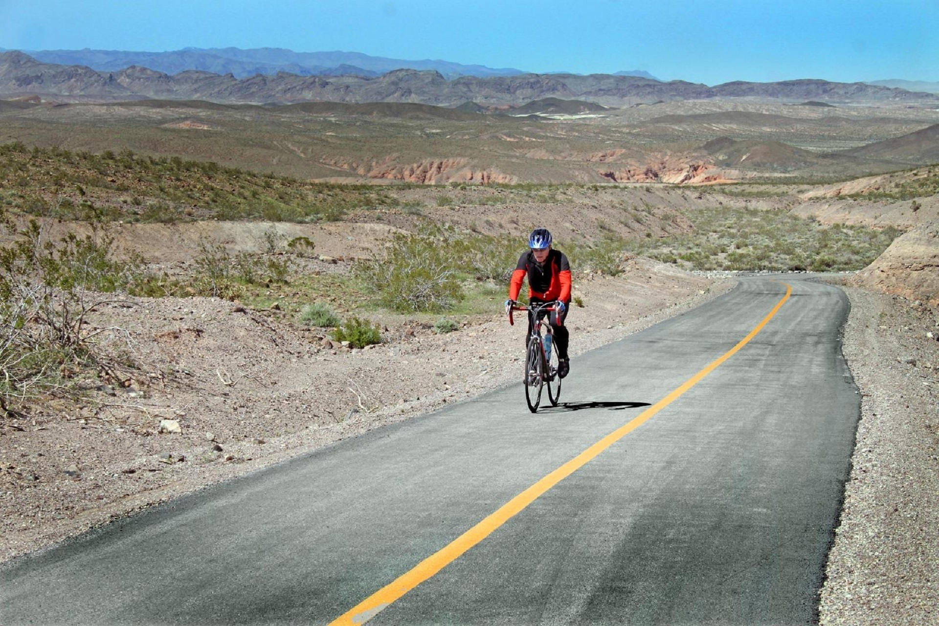 <p>Photograph of a cyclist. </p>
