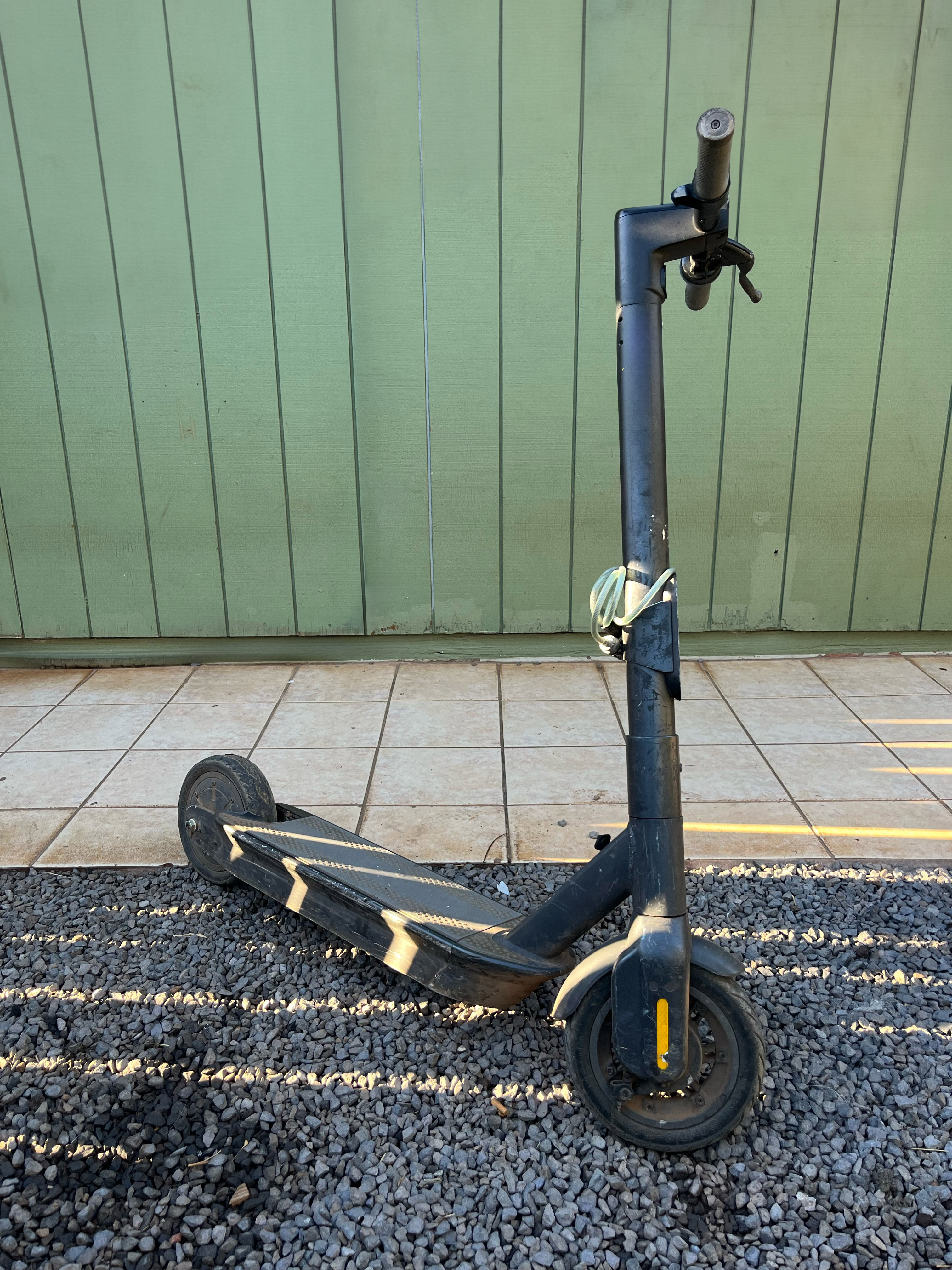 A photograph of a stand-on electric scooter.