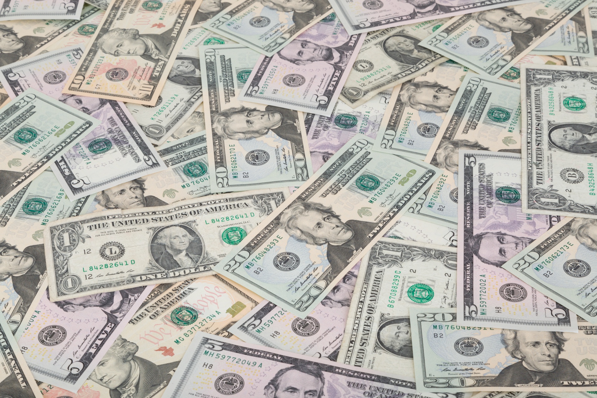 <p>full frame US paper currency of varying value</p>

