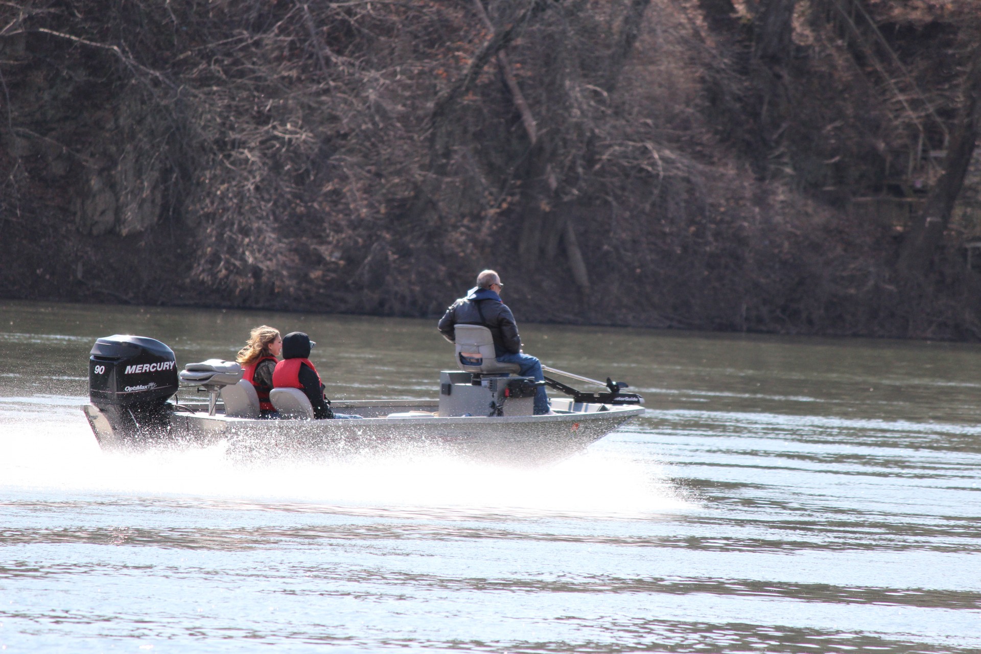 <p>family boating on a river</p>
