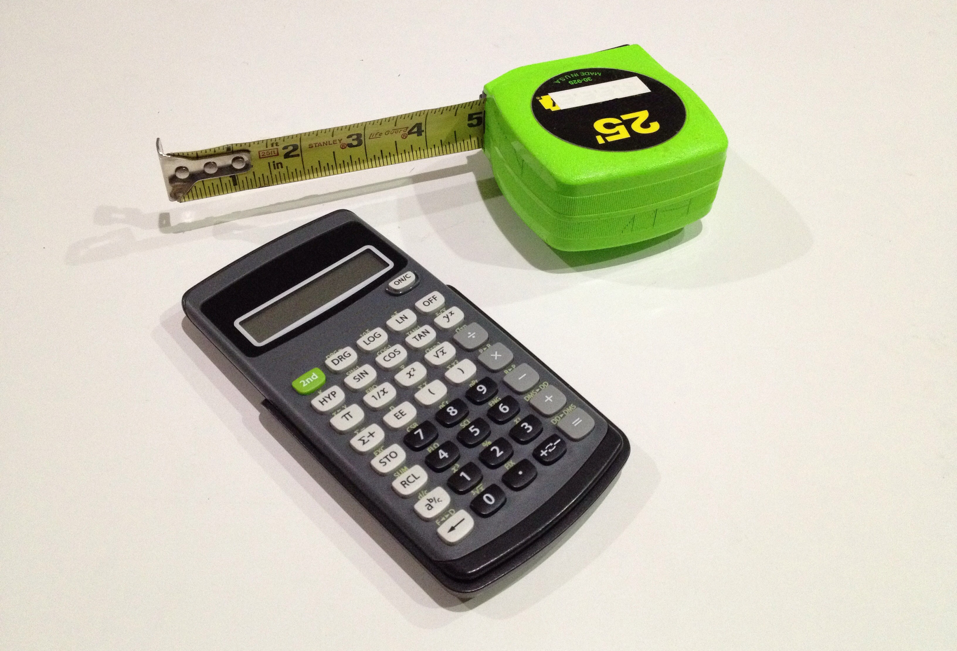 <p>A calculator and a tape measure</p>

