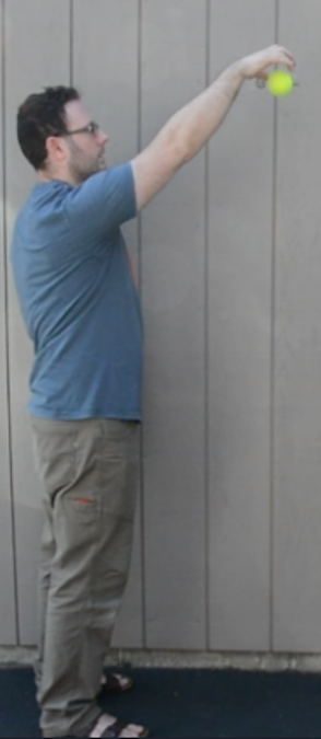 <p>A man dropping a ball. </p>
