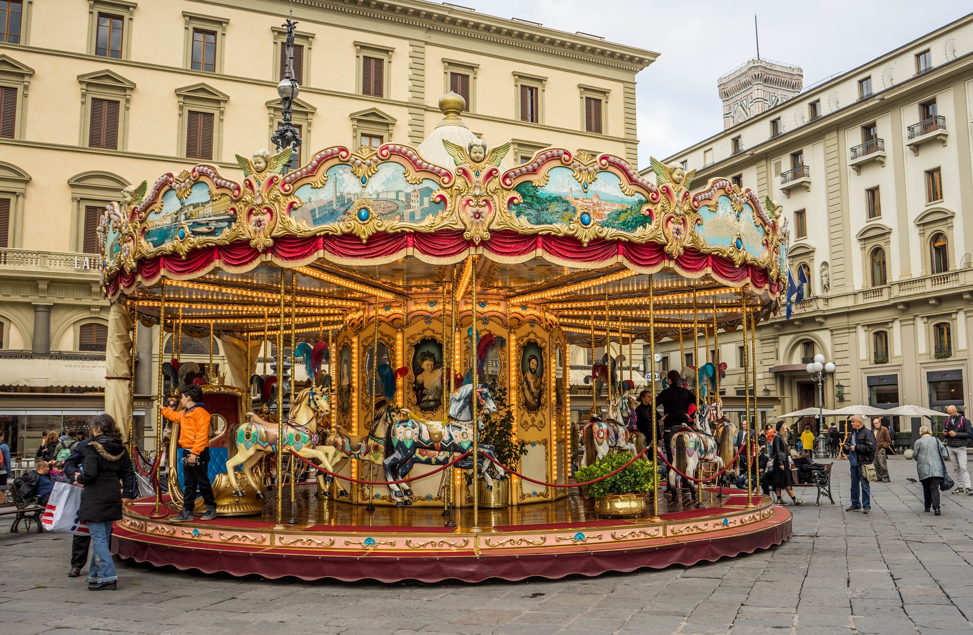 <p>A photograph of a large carousel </p>
