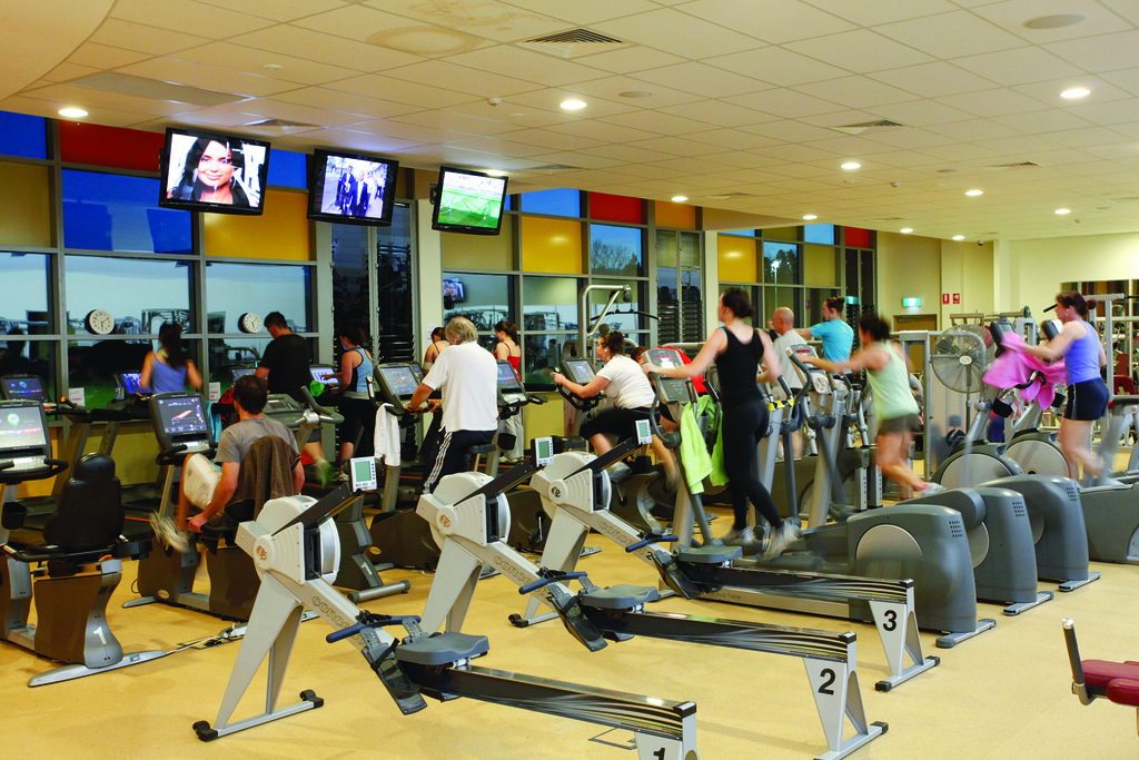 <p>People working out at a gym</p>
