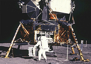 <p>A photograph of an astronaut next to the Lunar Module.</p>
