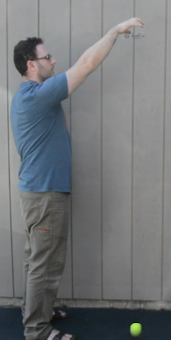 <p>A man dropping a ball. </p>
