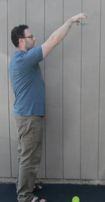 <p>A man dropping a ball. </p>
