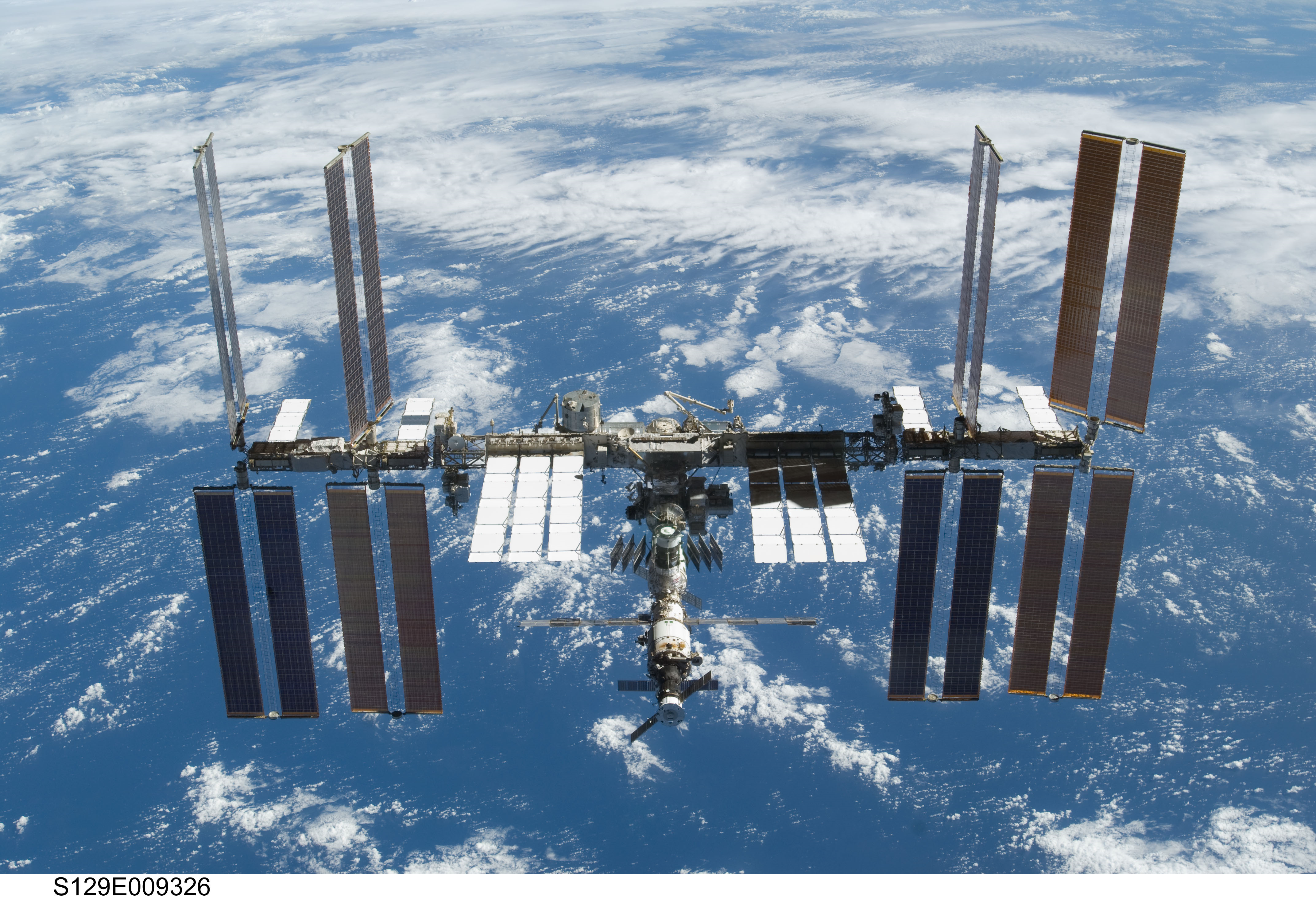 <p>Picture. International Space Station in space above earth. </p>
