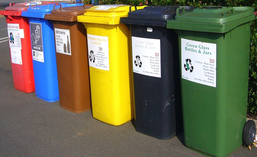 <p>A photo of recycling bins.</p>
