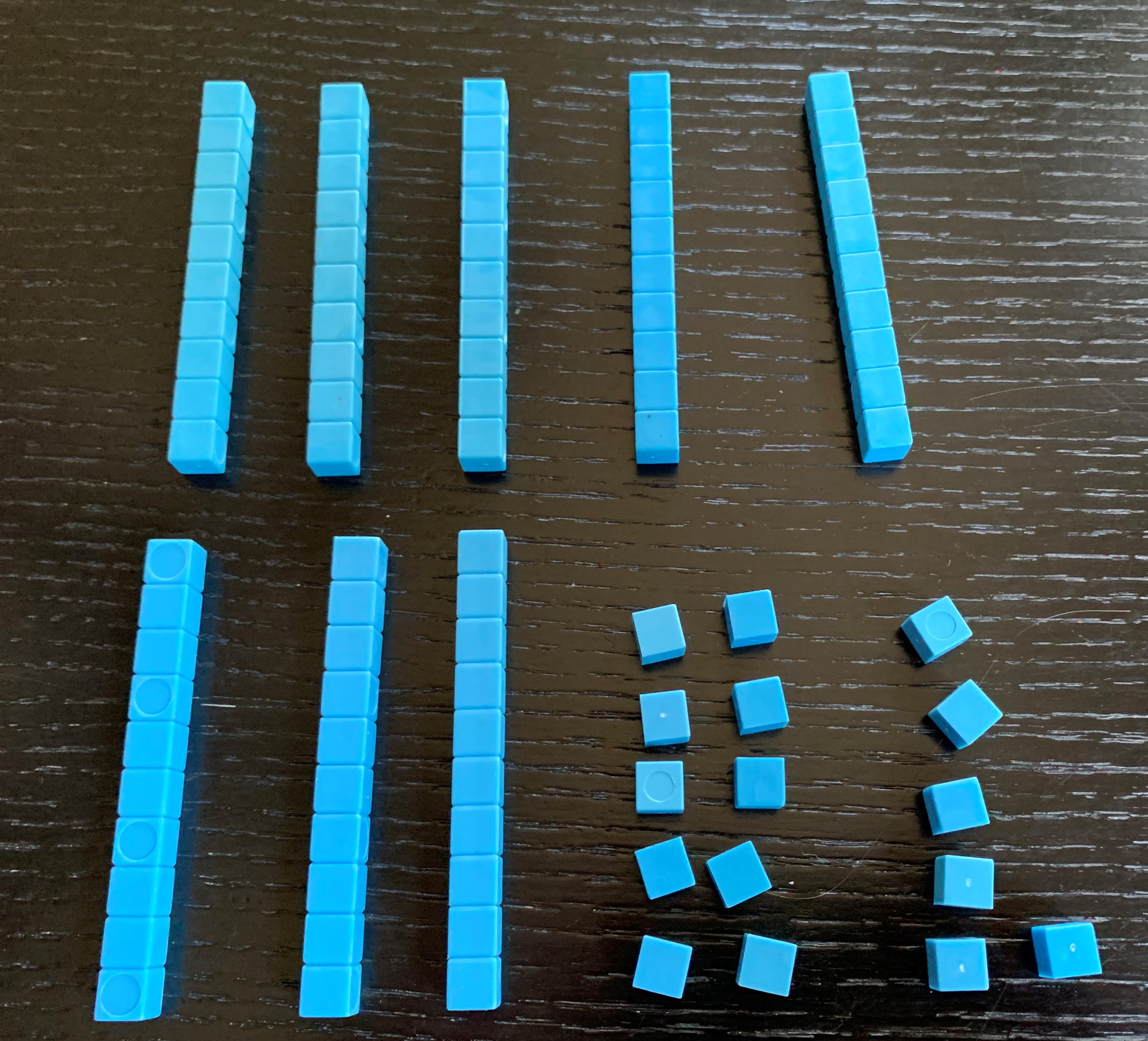 Base ten blocks. 8 tens, 16 ones.