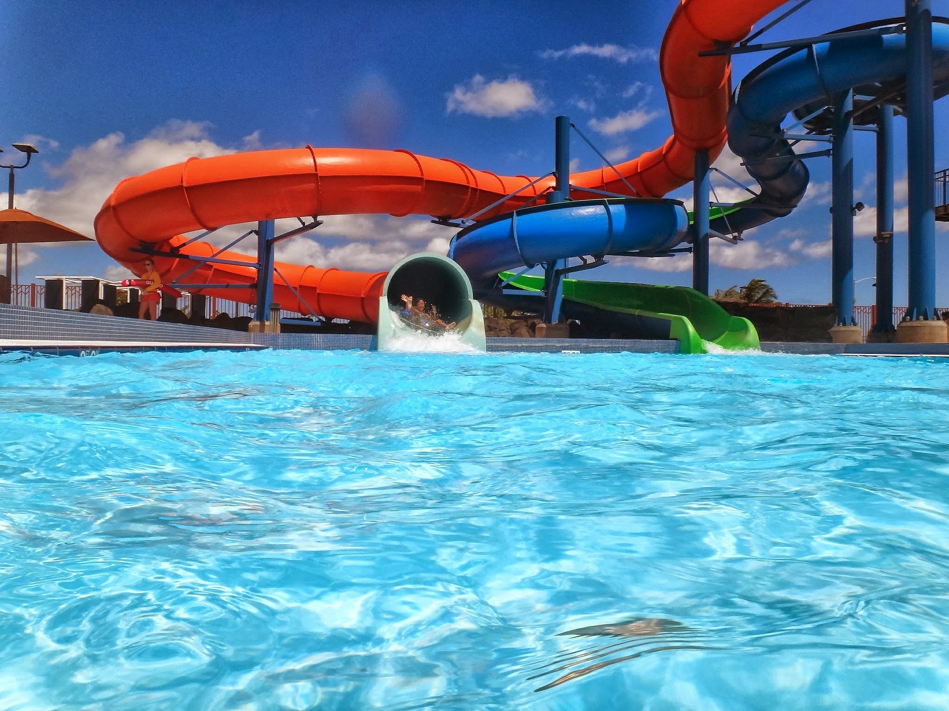 <p>a photo of slides and a pool at a water park</p>
