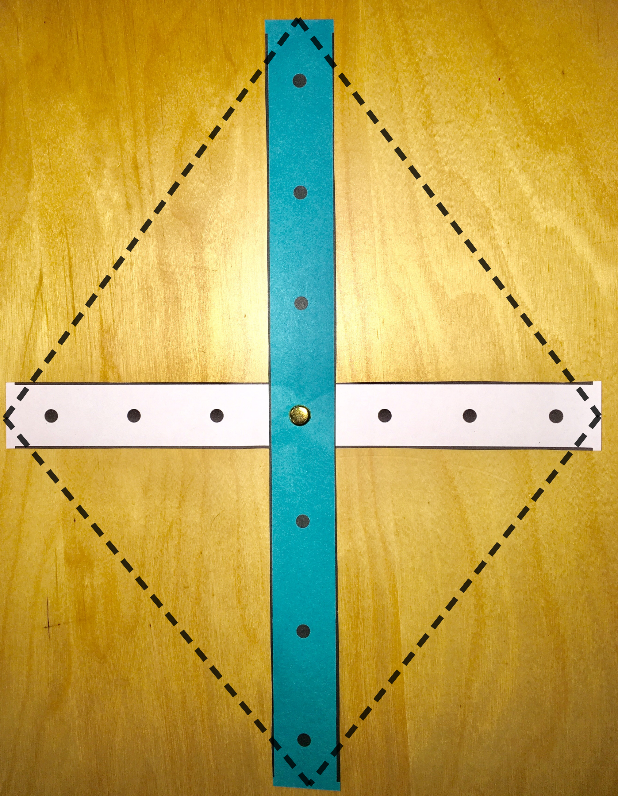 <p>Picture of strips making a cross to form a kite.<br>
 </p>
