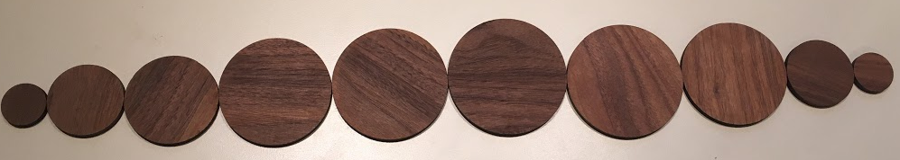 <p>10 circles from small to large at the middle and then back to small.</p>
