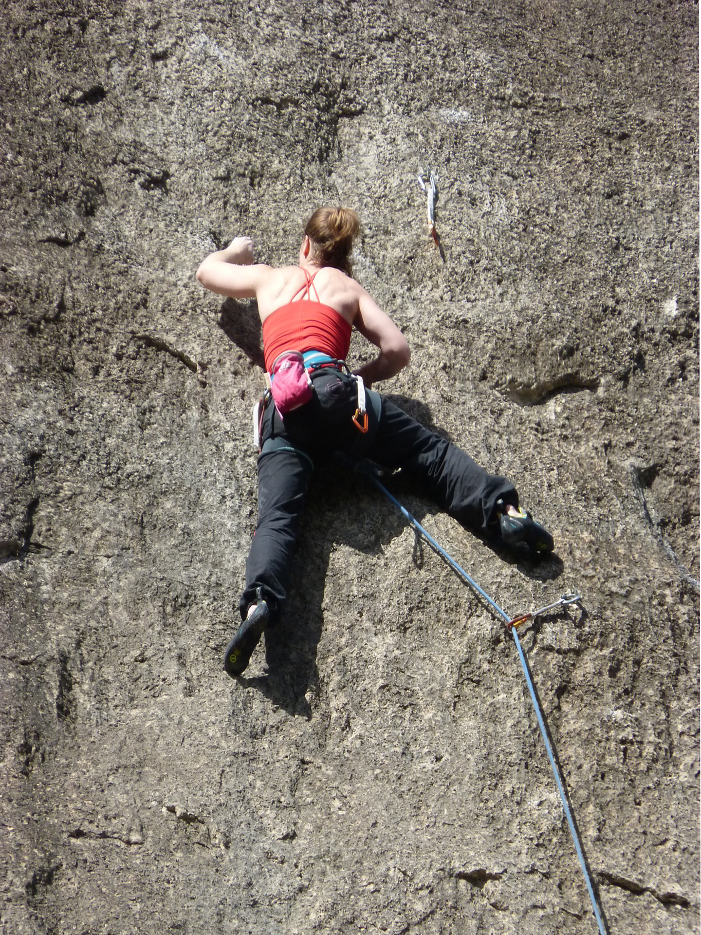 <p>A photo of a rock climber. </p>
