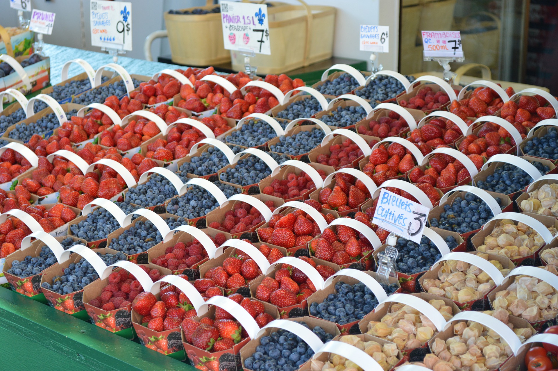 Baskets of strawberries and blueberries 