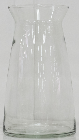 <p>Photo of a glass vase.  The sides are not perpendicular, instead tilting in until just before the top of the vase and then tilting back out to end almost directly above the edge of the base.</p>
