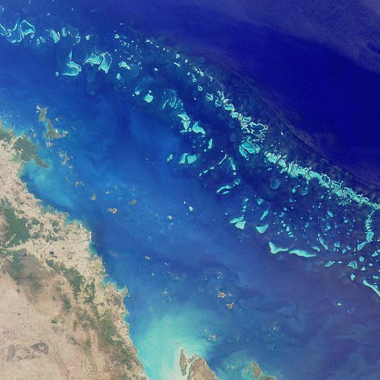 A photo looking down at the ocean from above.