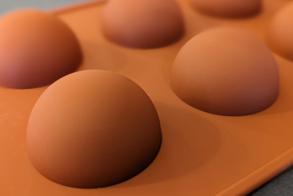 A set of hemisphere molds.