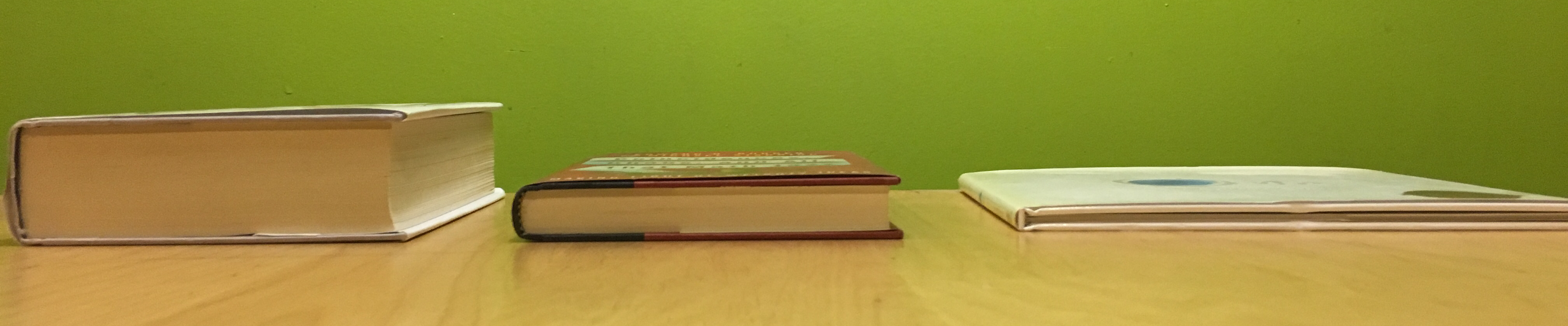 <p>Image of 3 books. Left book is longest, middle book is 276 pages, right book is shortest.<br>
 </p>

