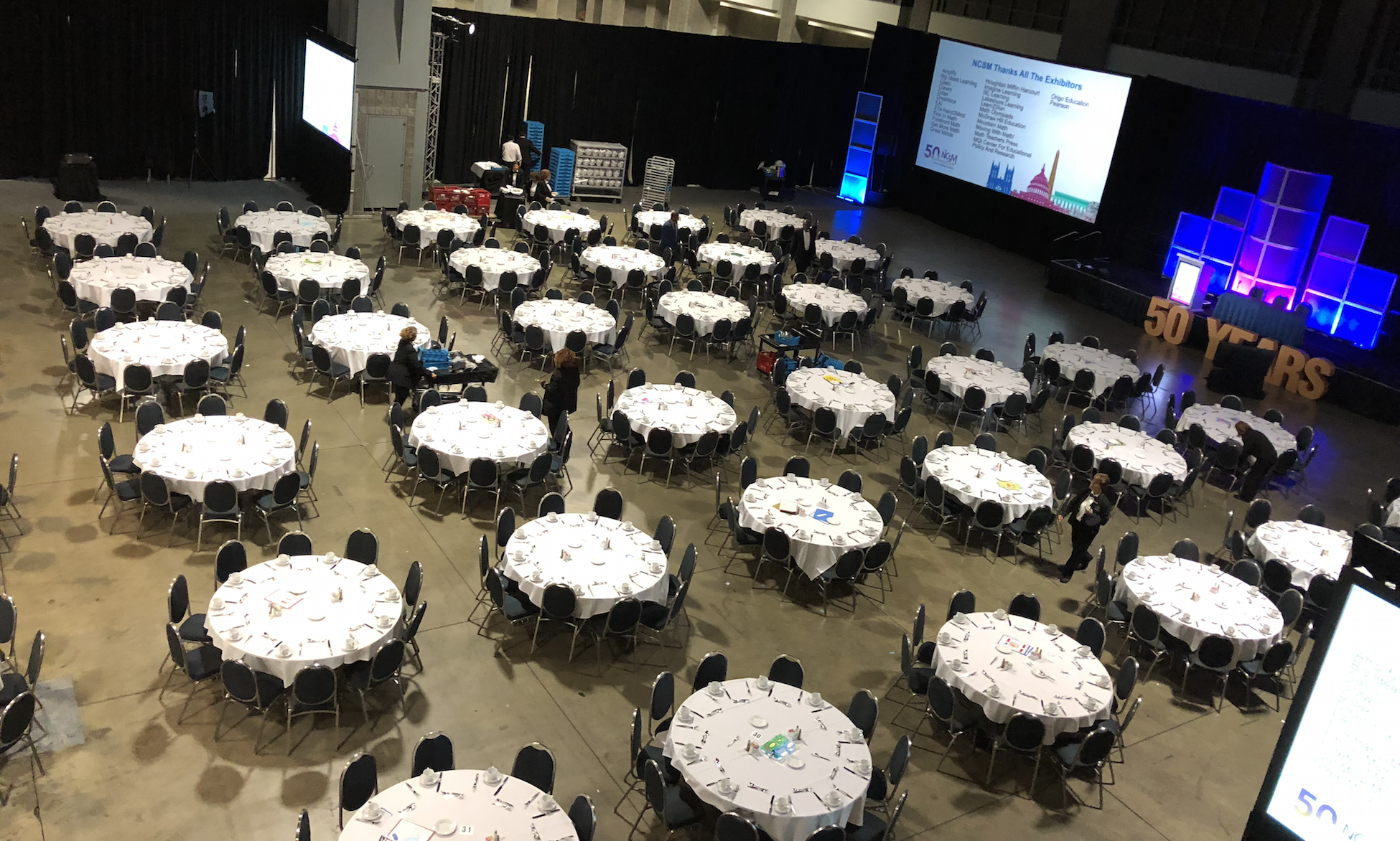 Array. 6 rows of 6 tables. Each table has 8 to 10 chairs.